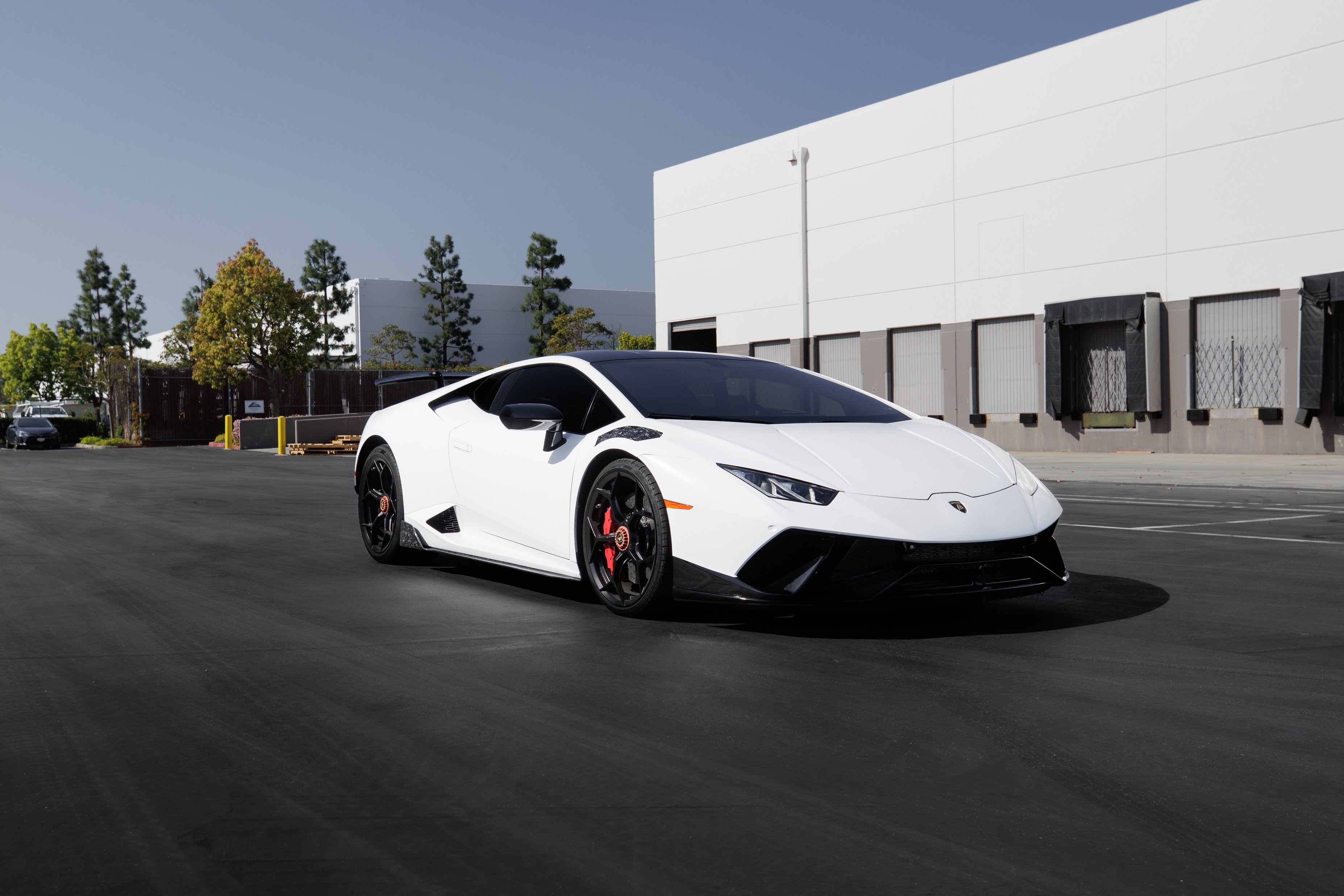 White Sportscar Parked on Street Side